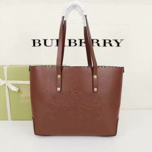 Burberry Embossed Crest Leather Tote In Brown