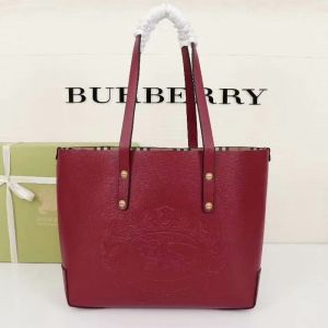Burberry Embossed Crest Leather Tote In Burgundy