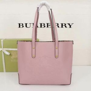 Burberry Embossed Crest Leather Tote In Pink